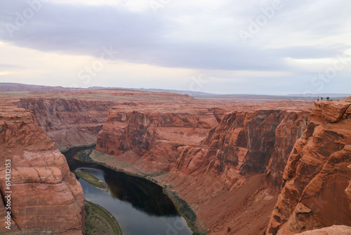 The colorado river carves its way through the sandstone canyon located at Horseshoe Bend in Glen Canyon National Recreation Area, Grand Canyon National Park Arizona