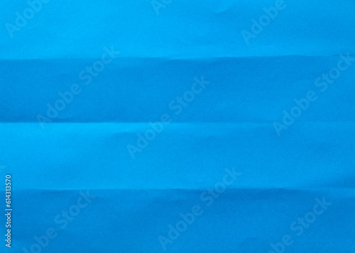 Folded blue paper for background. 