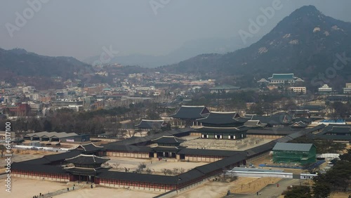 Gyeongbok Palace High Angle with Blue House and Mountains in Distance in Gwanghwamun Seoul South Korea photo