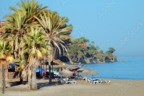 Afternoon at a beach with umbrellas  Spain