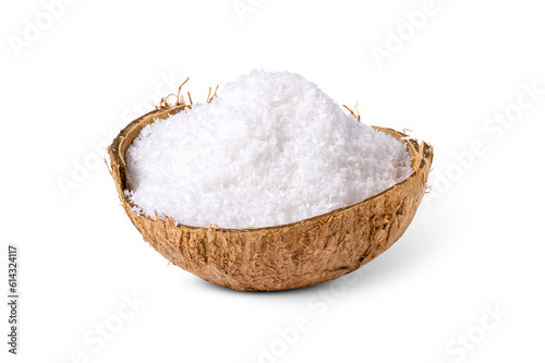 Fotografie Coconut milk powder (shredded coconut, coconut flour) in coco nut shell isolated on white background with clipping path