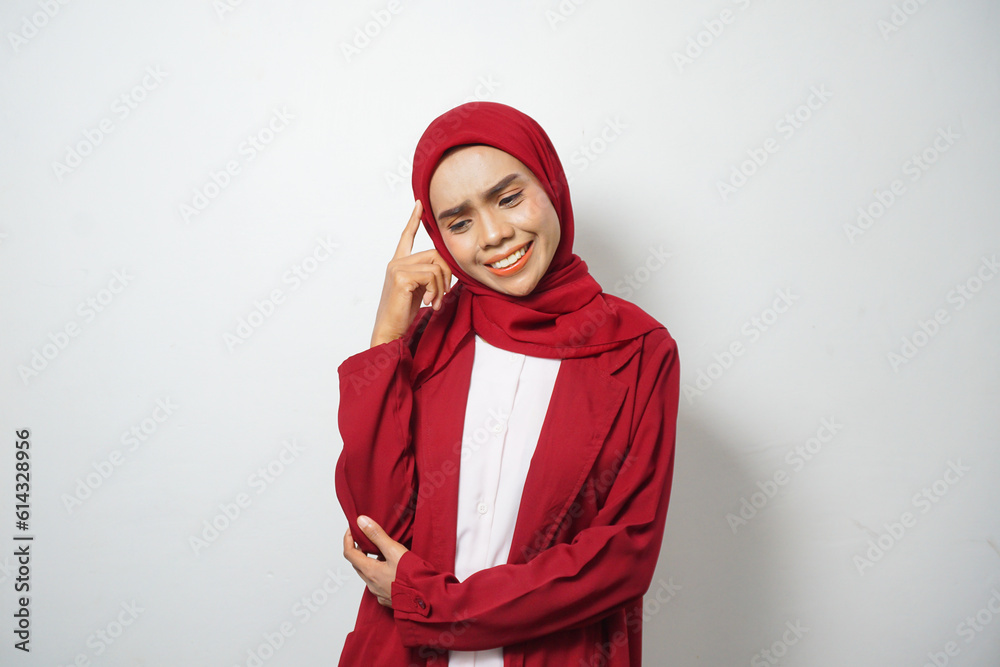 Asian Muslim businesswoman in red casual clothes thinking isolated on white background Asian Muslim businesswoman in red casual clothes thinking isolated on white background