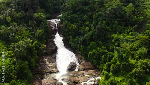 Beautiful waterfall in the rainforest. Bopath Falls in the tropical mountain jungle. Sri Lanka. photo