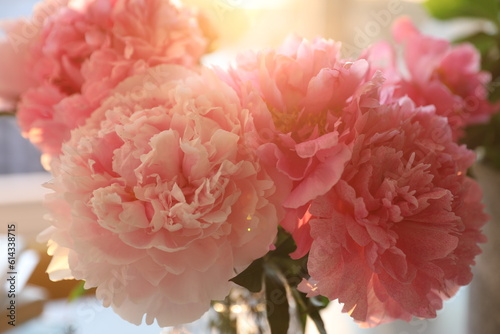 Fototapeta Naklejka Na Ścianę i Meble -  Bouquet of pink peonies at home on the table