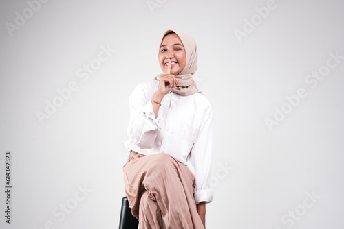 Fashion portrait of young beautiful asian muslim woman with wearing hijab isolated on white background. 