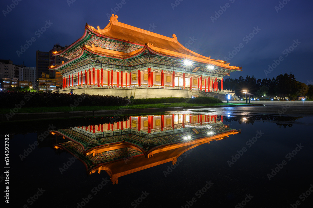 There are beautiful reflections on the water in Liberty Square. The Chiang Kai-shek Memorial Hall and the National Concert Hall after the rain.