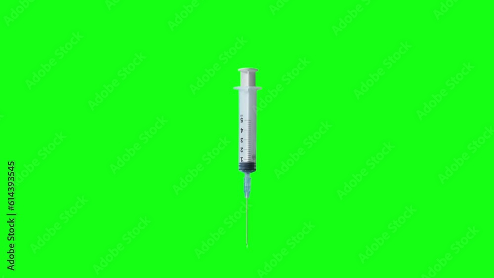 Medical syringe on the green screen Medical syringe on the green screen