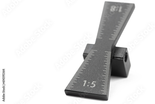 Foto Metal dovetail jig template isolated above white background with copy space