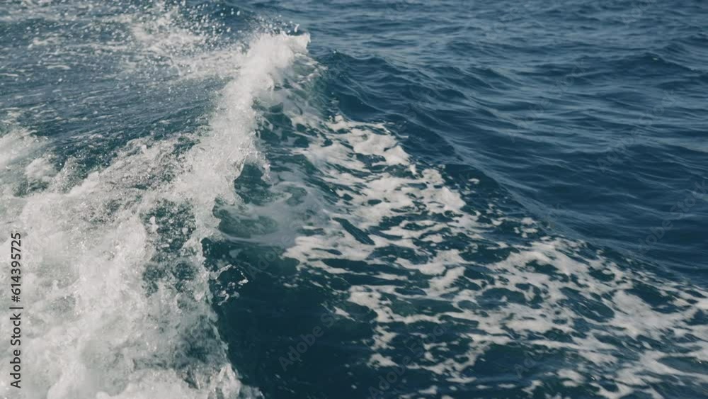 Slow motion of boat trail on a sea surface Slow motion of boat trail on a sea surface
