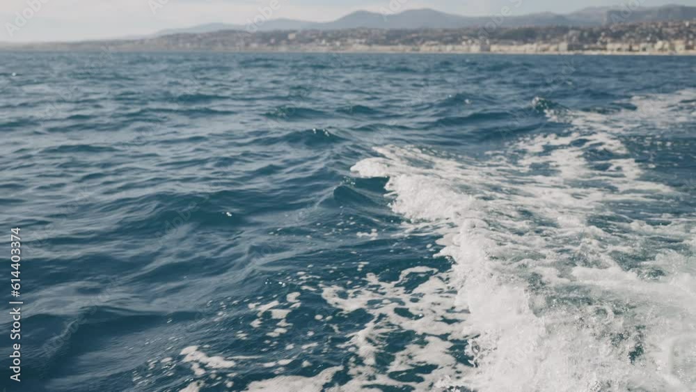 Slow motion of boat trail on a sea surface Slow motion of boat trail on a sea surface