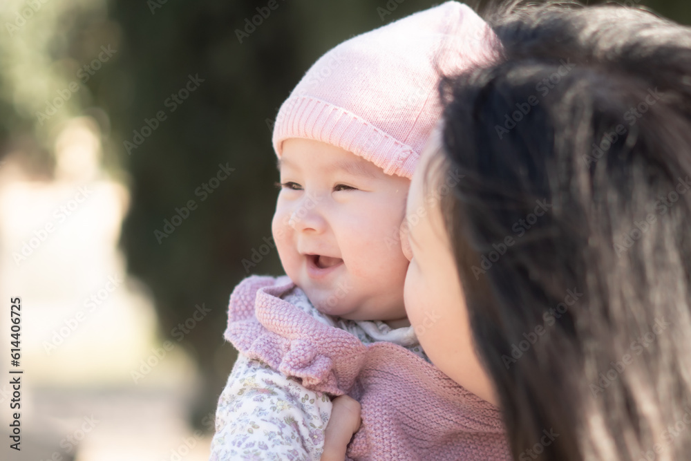 pure joy as a young Asian Chinese mother lovingly plays with her little baby girl, creating a lasting affection happiness bond - motherhood beauty and childhood innocence pure joy as a young Asian Chinese mother lovingly plays with her little baby girl, creating a lasting affection happiness bond - motherhood beauty and childhood innocence