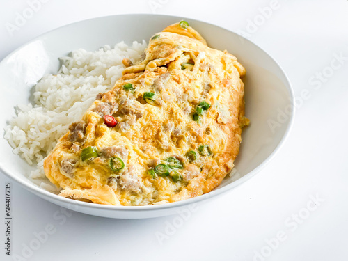 Omelet with pork and chili on rice on  the white background