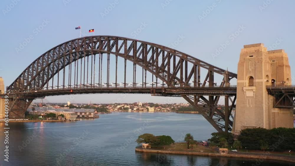 Massive Sydney Harbour bridge arch across harbour – aerial flying as 4k.
Massive Sydney Harbour bridge arch across harbour – aerial flying as 4k.