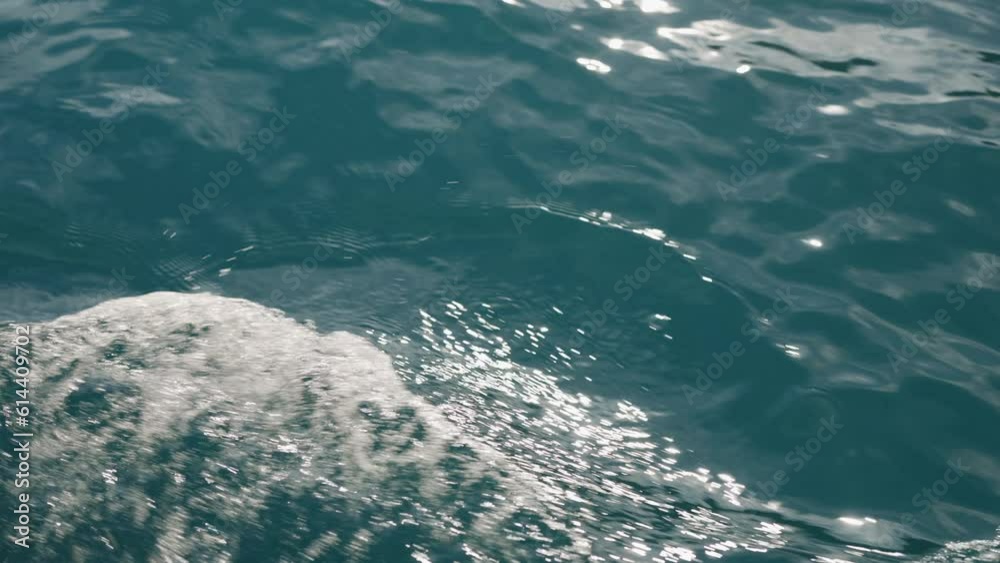Slow motion of boat trail on a sea surface Slow motion of boat trail on a sea surface