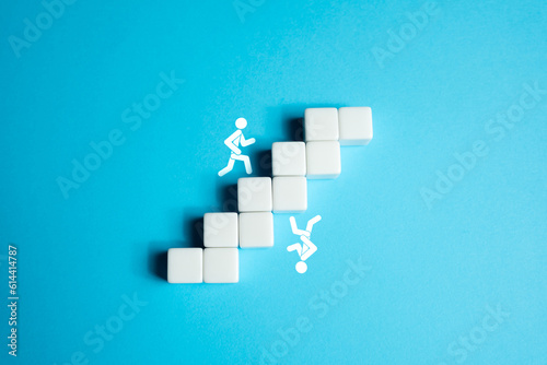 Fototapeta People are chasing each other up the inverted stairs