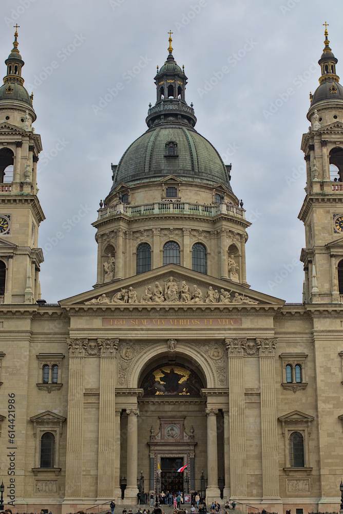 Fototapeta premium Budapest, Hungary - View of St. Stephen\'s Basilica, a Roman Catholic basilica. Panorama of a typical pedestrian street in the center of Budapest in the tourist part of the old town.