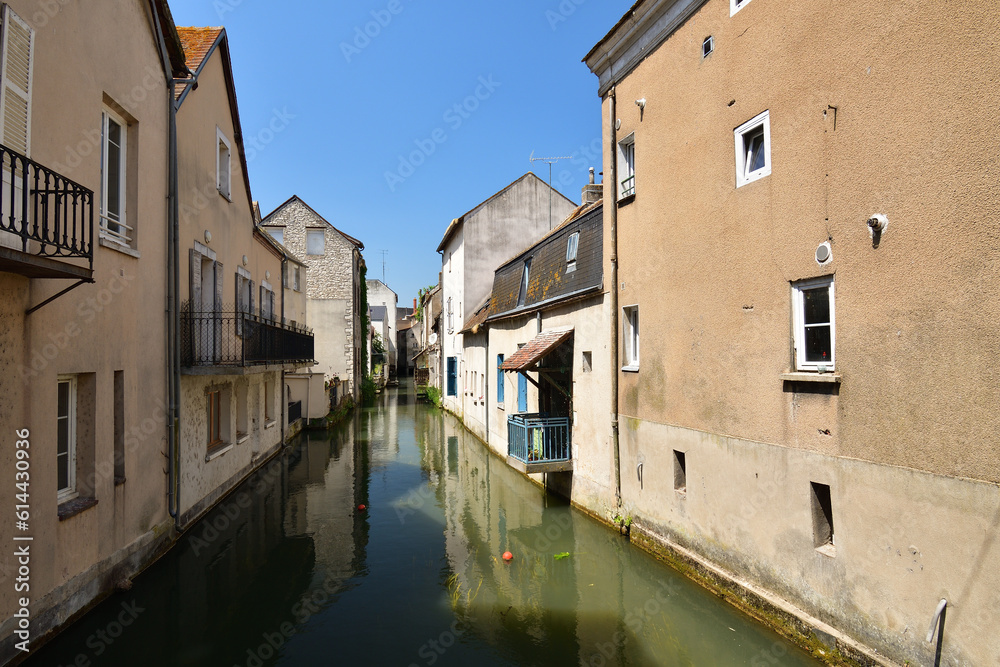 France, Montargis. Cityscape with a canal. May 29, 2023.