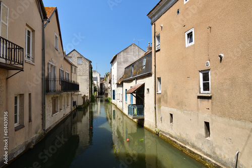 France, Montargis. Cityscape with a canal. May 29, 2023.