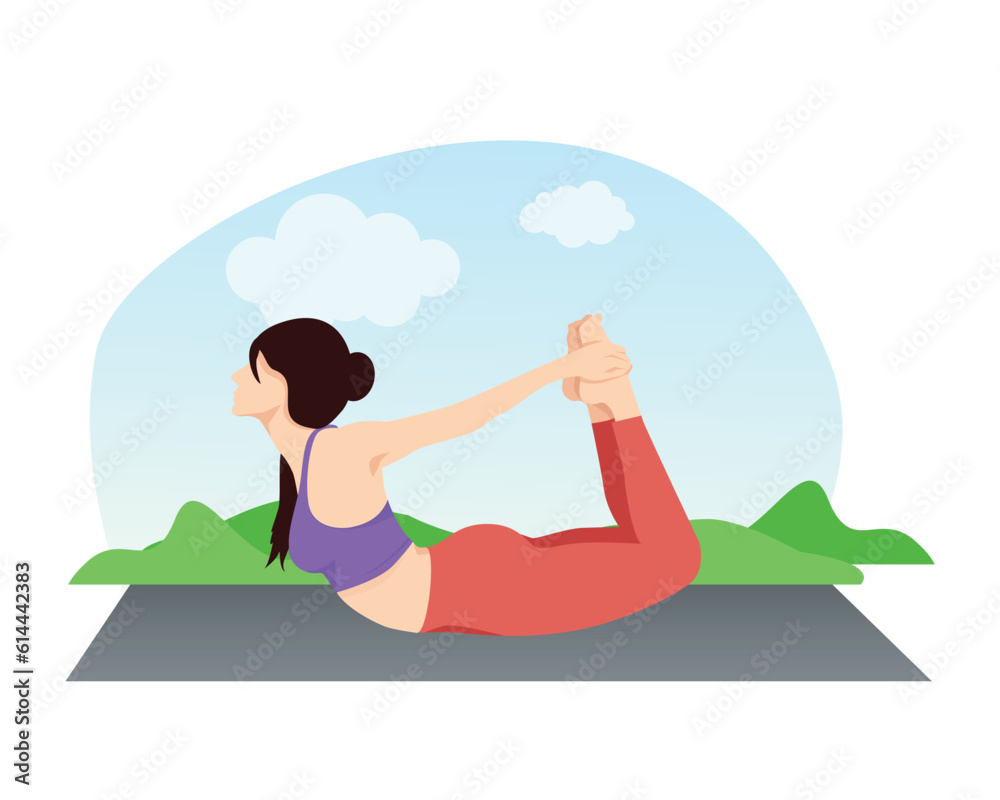Young attractive woman practicing Dhanurasana-Bow pose yoga.