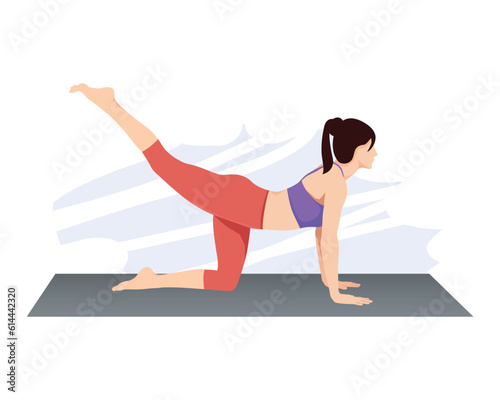 Woman doing bird dog yoga exercise to train core muscle on grey mat.