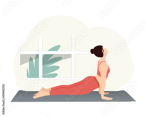Woman doing upward facing dog Pose, practice Urdhva Mukha Svanasana, practicing yoga exercise.