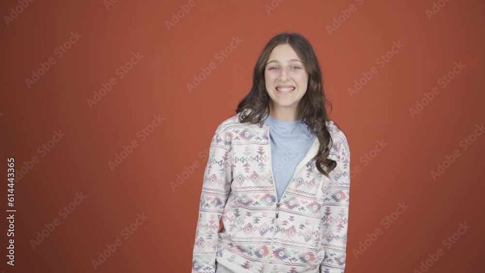 Young woman smiling at camera Young woman smiling at camera