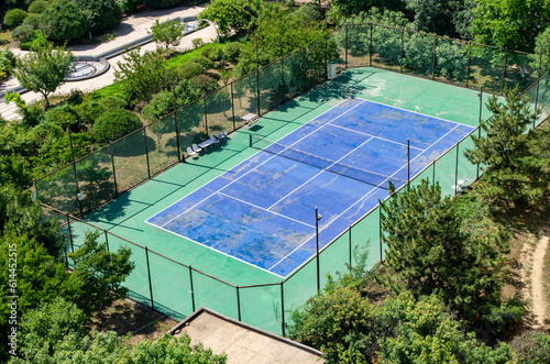 Empty Tennis Court in the community © JUN LI