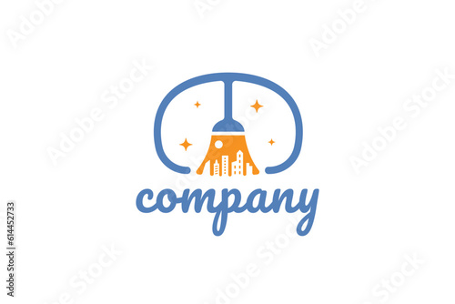 Creative logo design depicting a broom with a city in the center, designated to the cleaning industry.