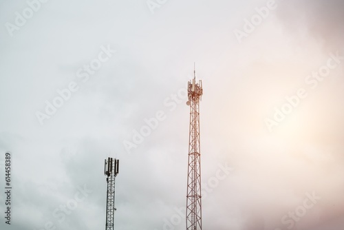 A cell phone LTE and 5g tower with a sky background