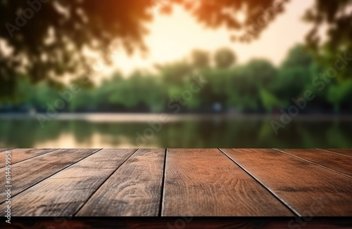 Wooden table top on blur green forest and lake or swamp. Fresh and Relax concept. For montage product display. High quality photo