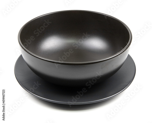 Black ceramic bowl isolated on white background.