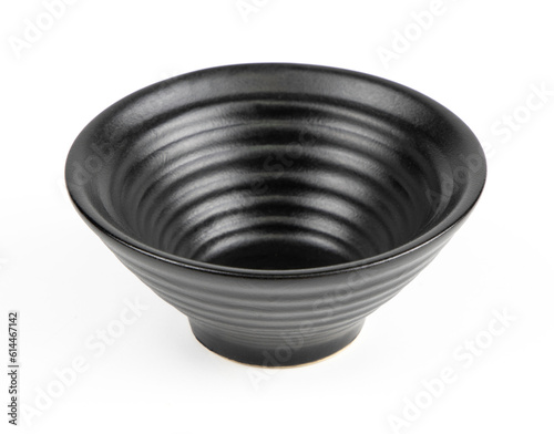 Black ceramic bowl isolated on white background.