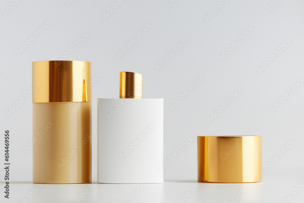 Composition of cosmetic packaging mockups. Gold bottle caps. Skin care product presentation. Elegant mockup. Beauty and spa. Warm shadows, copy space. Generative AI Composition of cosmetic packaging mockups. Gold bottle caps. Skin care product presentation. Elegant mockup. Beauty and spa. Warm shadows, copy space. Generative AI