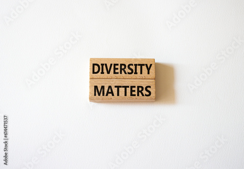 Diversity matters symbol. Wooden blocks with words Diversity matters. Beautiful white background. Business and Diversity matters concept. Copy space.