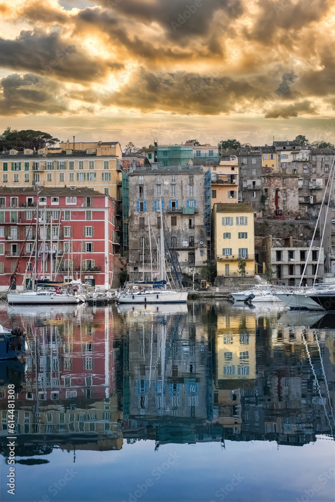 Corsica, Bastia, typical houses in the harbor in summer, sunset
