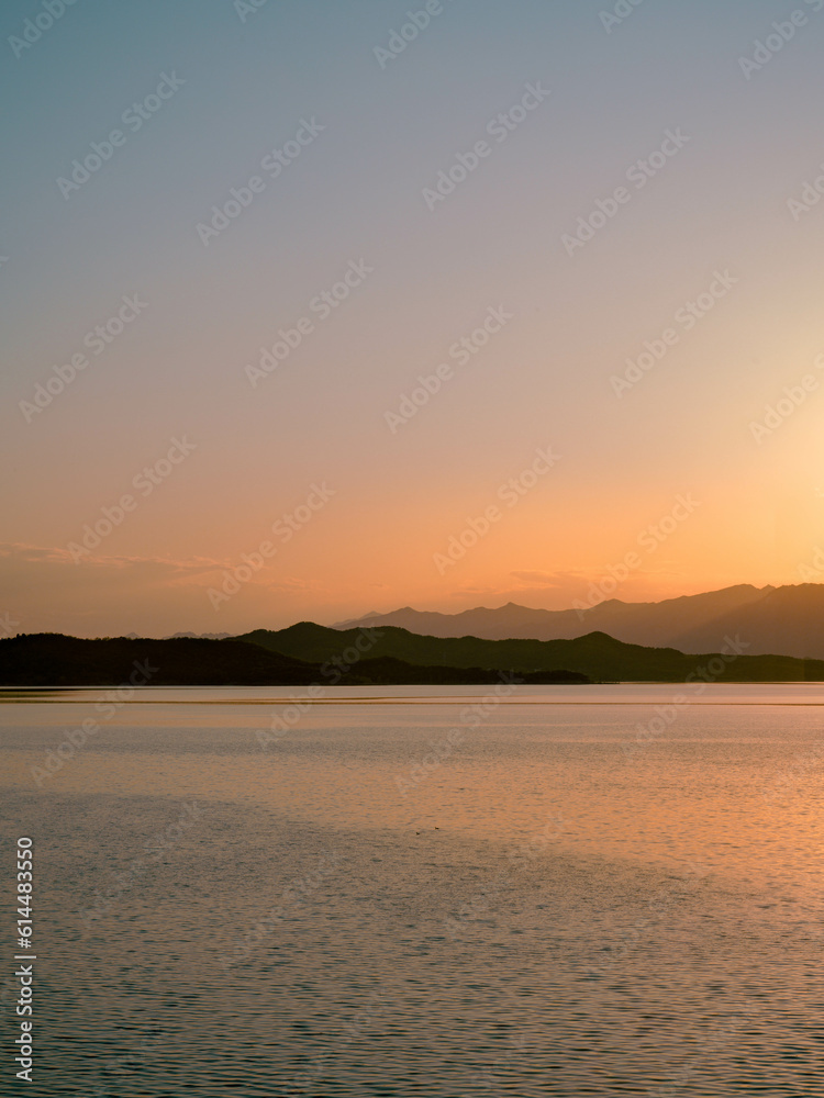 peaceful sunset landscape of reservoir
