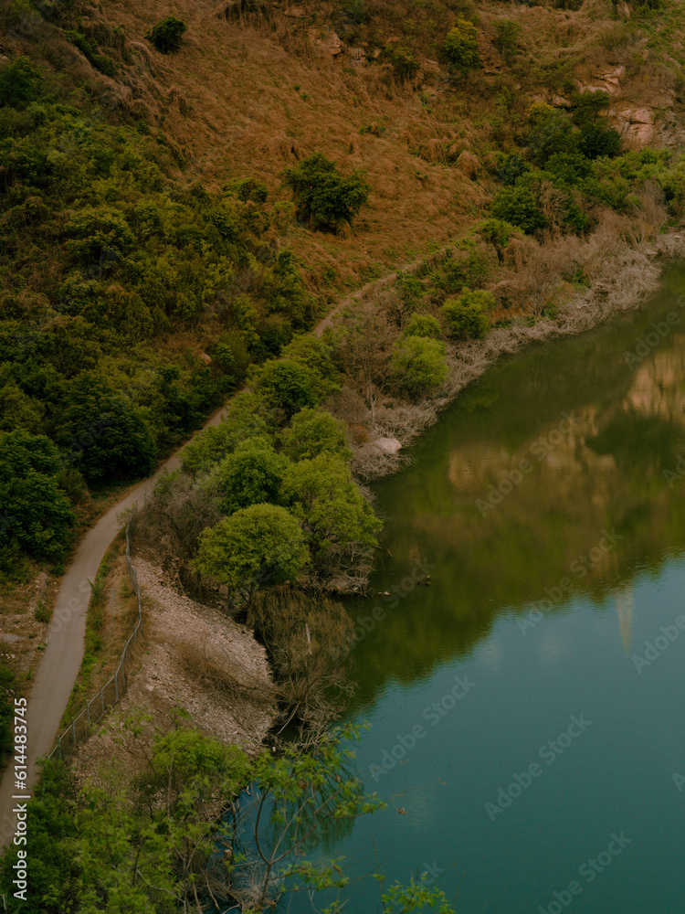 Fototapeta premium Reflection of mountains and clouds