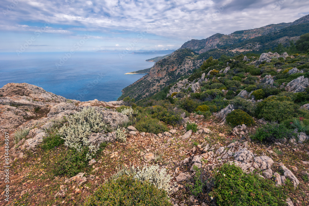 Panoramic landscape from rocky hill top to coastline, mountains, beaches and sea, Lycian Way, Turkey