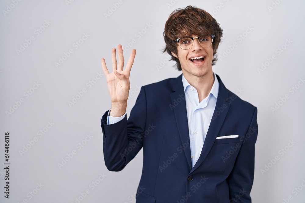 Hispanic business young man wearing glasses showing and pointing up with fingers number four while smiling confident and happy. Hispanic business young man wearing glasses showing and pointing up with fingers number four while smiling confident and happy.