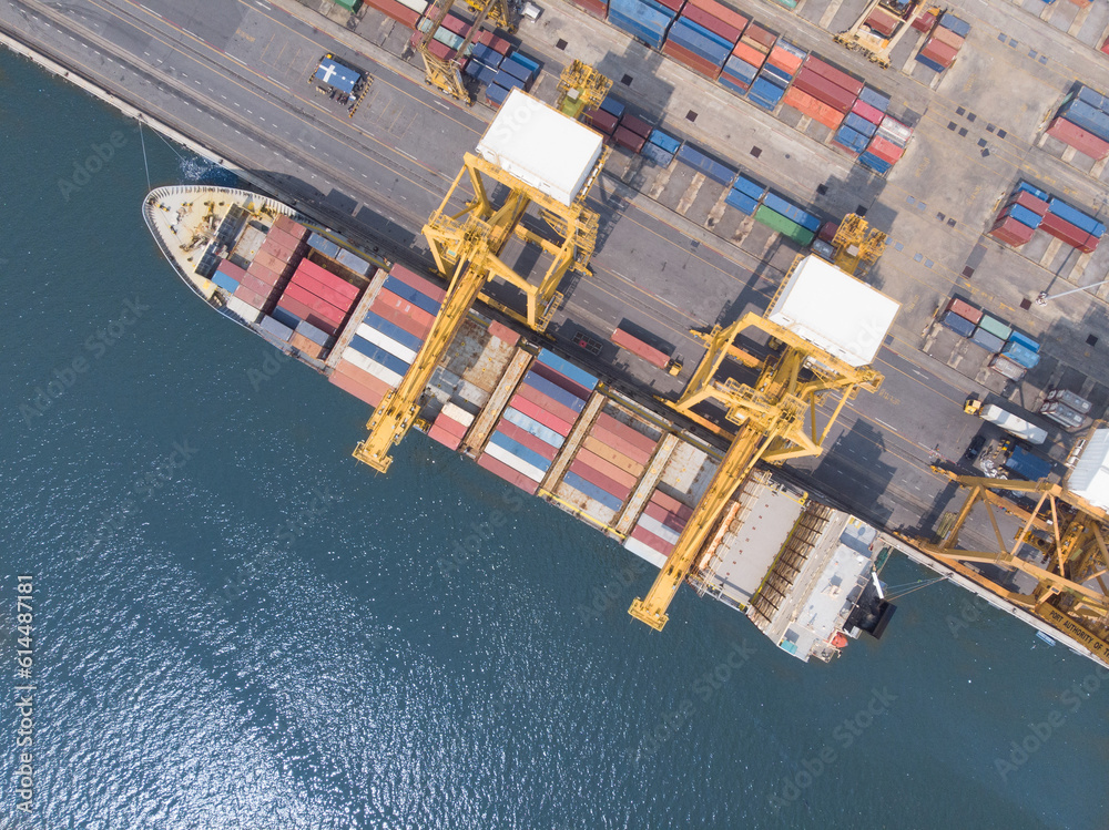Top viewContainer ship loading and unloading in sea port, Aerial view of business logistic import and export freight transportation  ship in harbor, Container loading Cargo freight ship, Dubai