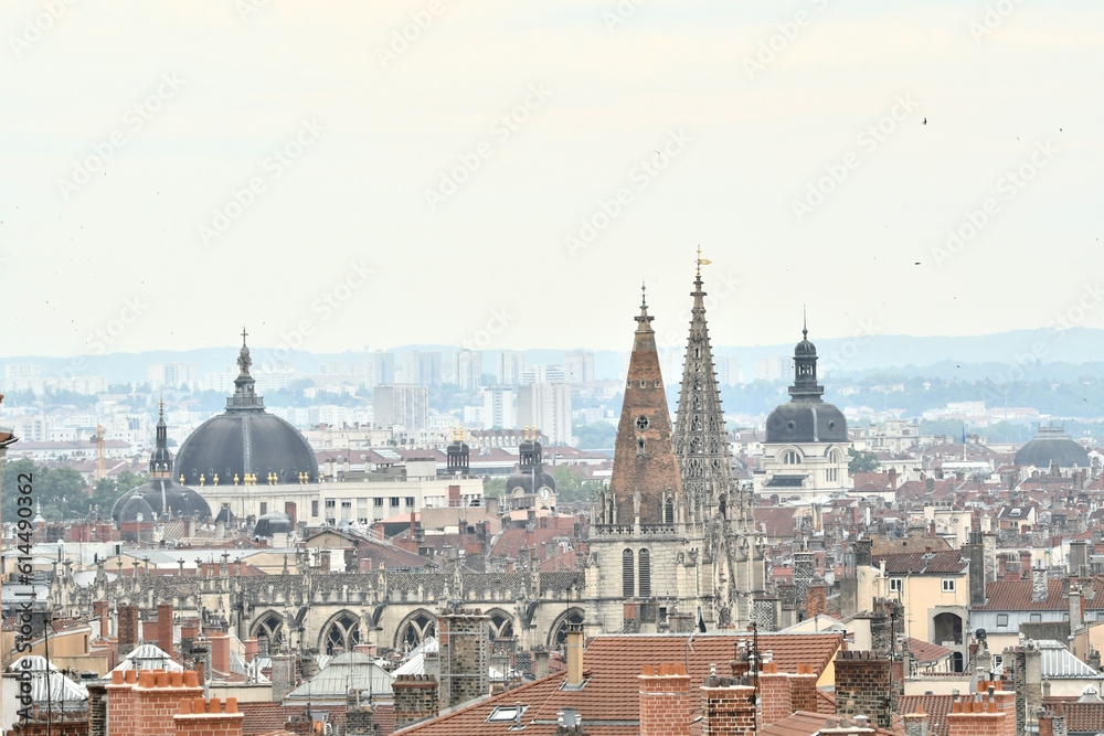 Lyon cityscape with many roofs and different ancient domes and towers from the Saint Nizier Church and the grand hotel Dieu Lyon cityscape with many roofs and different ancient domes and towers from the Saint Nizier Church and the grand hotel Dieu