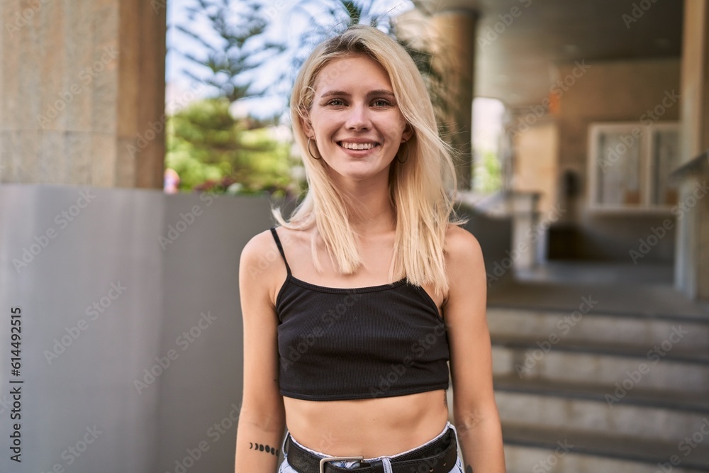 Young blonde woman smiling confident standing at street Young blonde woman smiling confident standing at street