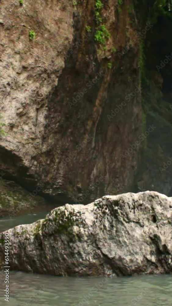 Mountain river flowing in a canyon in springtime