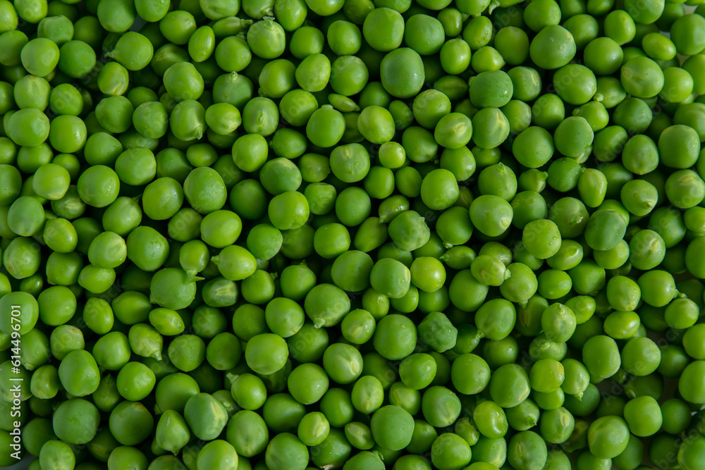 Fresh sweet green peas background texture complete all the picture - top view. Fresh sweet green peas background texture complete all the picture - top view.