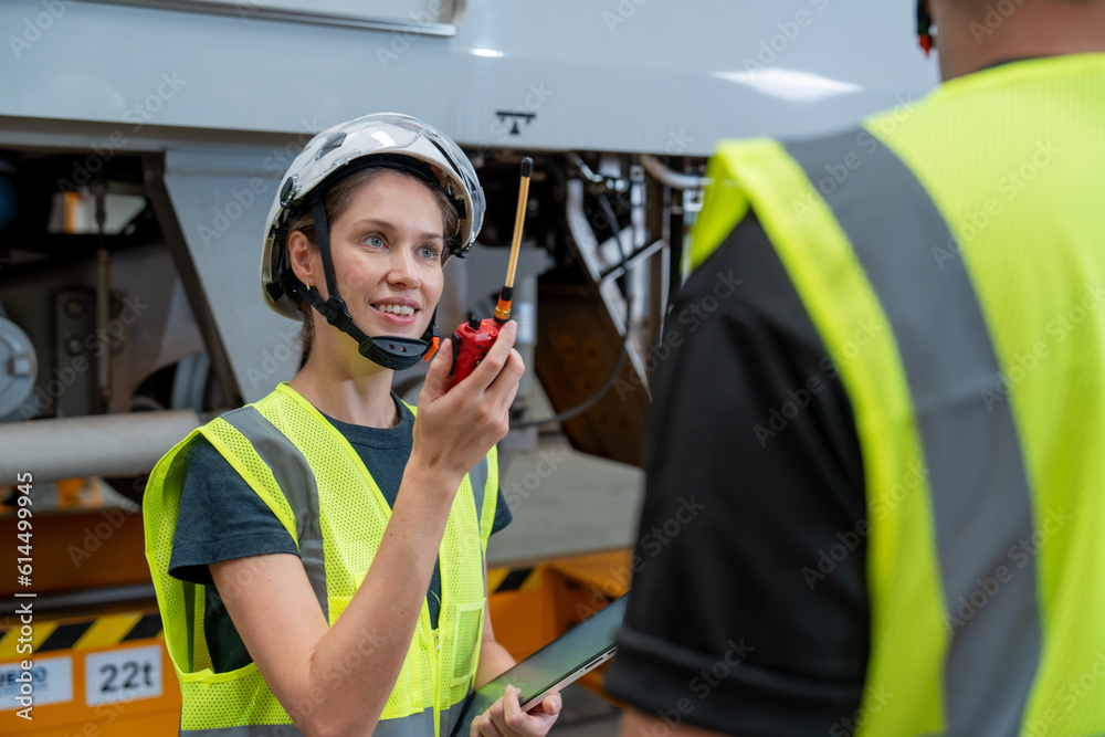 custom made wallpaper toronto digitalA woman engineer with a radio transmitter coordinates with the train operation control tower to bring the train to the station for rehearsal.