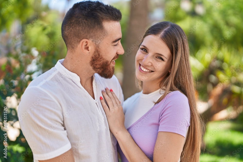 Man and woman couple smiling confident hugging each other at park Man and woman couple smiling confident hugging each other at park