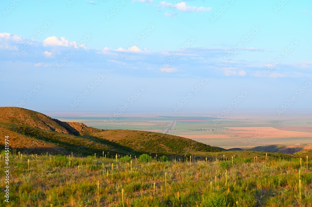 Obraz premium Archarly pass. View from top of the hills above the road connecting Kaochagay and Saryozek