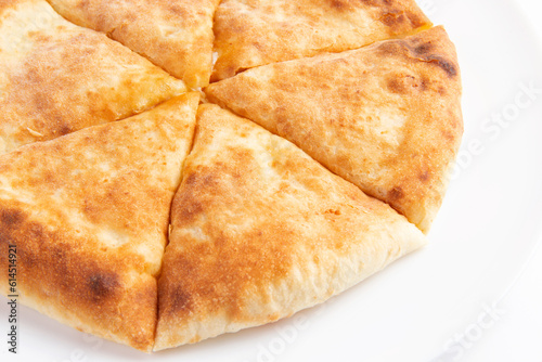Traditional cheese pie. Khachapuri. On a white background.