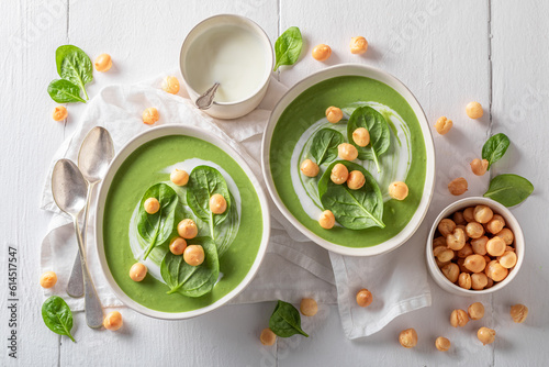 Vegan spinach soup served i...