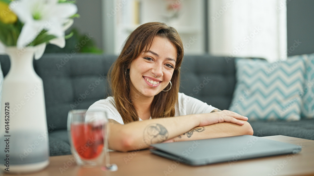 Young beautiful hispanic woman smiling confident sitting on floor at home Young beautiful hispanic woman smiling confident sitting on floor at home
